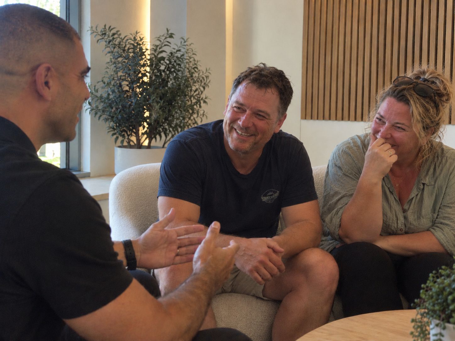 James talking with two clients